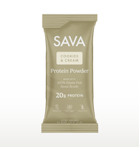 A single stand-up pouch of SAVA Cookies & Cream Protein Powder, shown on a clean white background. The packaging is a warm beige/taupe color with white text and a small cream-colored label.