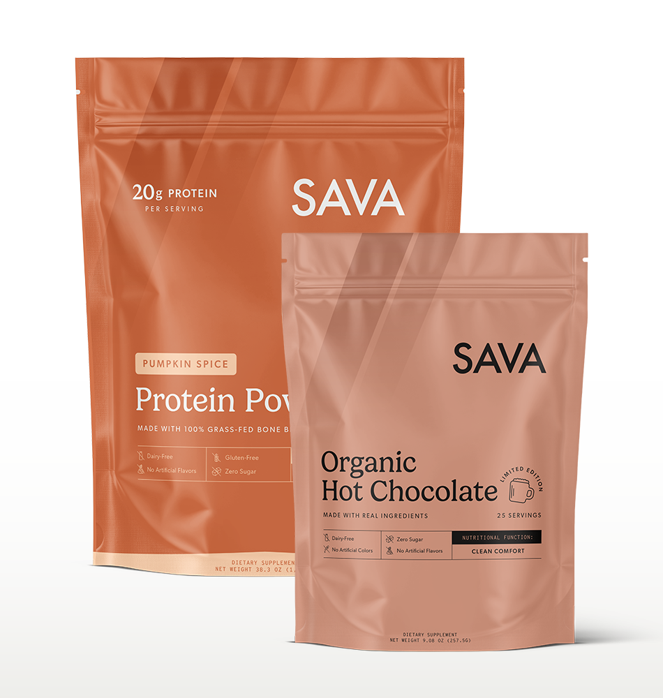 Two SAVA stand-up pouches of protein powder on a clean white background: a larger Pumpkin Spice pouch in back and a smaller Organic Hot Chocolate pouch in front.